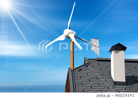 Small Wind Turbine on the top of a Roof of a House 96029341
