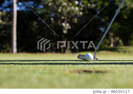Close Up of Golf club and ball in grass.. 96030127