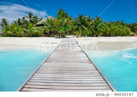 Way to paradise tropical resort island in ocean waves 96030197