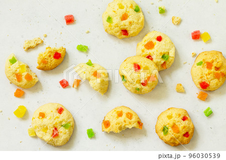 Cookies bar. Homemade cookies with candied fruit, isolate on a light stone table. Top view flat lay background. Cookies bar. Homemade cookies with candied fruit, isolate on a light stone table. Top view flat lay background. 96030539