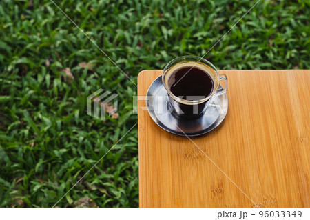 Top view cup of coffee on wooden table. 96033349