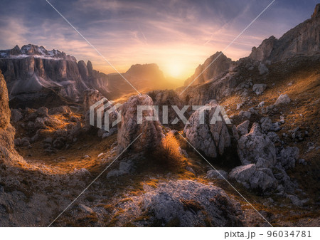 Rocks and stones at colorful sunset in autumn in Dolomites, Italy 96034781