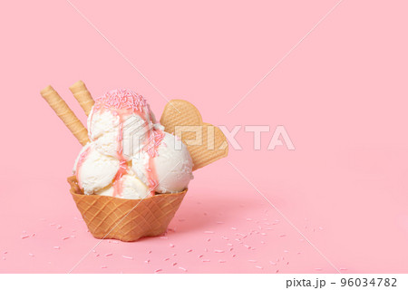 cone with scoops of ice cream strewed sprinkles cone with scoops of ice cream strewed sprinkles 96034782