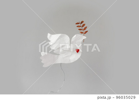 Dove of peace made of crumpled paper with blood splashes on blue background. Stop war concept.  96035029