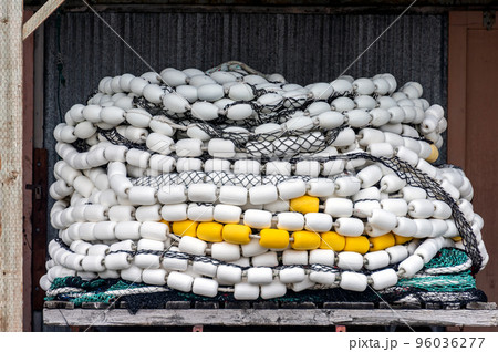Trawler fishing net and floats stored on woodenの写真素材 [96036277] - PIXTA