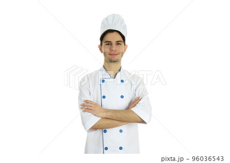 Young male chef isolated on white background Young male chef isolated on white background 96036543