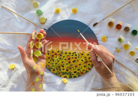 Concept of drawing, woman draw a painting with sunflowers Concept of drawing, woman draw a painting with sunflowers 96037103