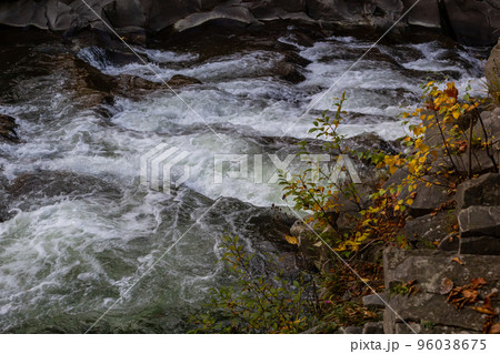 Waterfall and forest stream in the Carpathian mountains. Ukraine. Europe 96038675