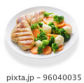 plate of grilled chicken with vegetables on white background 96040035