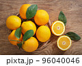 fresh orange fruits with leaves, top view 96040046