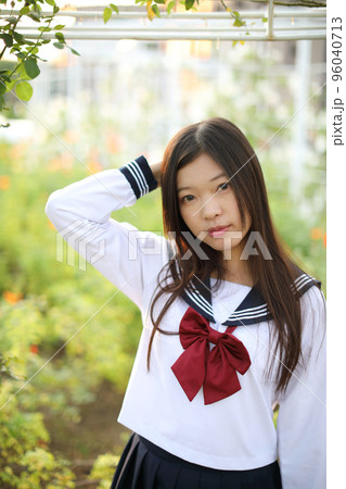 school girl costume at park outdoor with flowers garden background school girl costume at park outdoor with flowers garden background 96040713