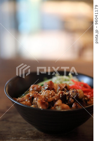 japanese food Chicken teriyaki with rice on wood background japanese food Chicken teriyaki with rice on wood background 96041179
