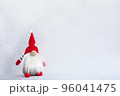 Christmas gnome in red hat holiday banner on light winter background 96041475