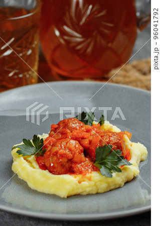 Meatballs in tomato sauce with mashed potato on the white plate, top view, view from above 96041792
