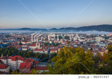 Cityscape of Graz with Mur river and Mariahilfer church (Mariahilferkirche), view from the Shlossberg hill, in Graz, Styria region, Austria 96045497
