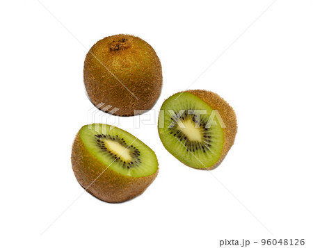 Unpeeled kiwi and two half on a white background Unpeeled kiwi and two half on a white background 96048126