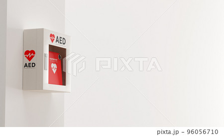 白い壁に取り付けられたAED（救命除細動器）のフォトリアルな3Dレンダリングイラスト 96056710