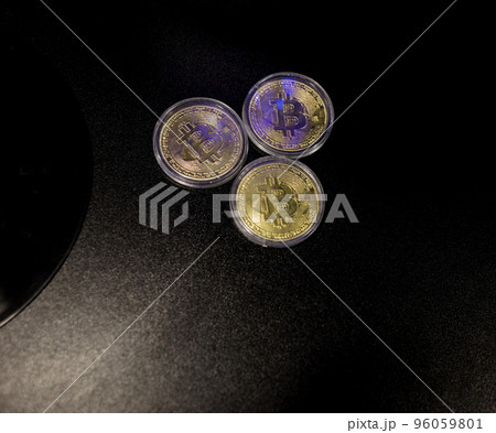 Three Gold Bitcoin Cryptocurrency Coins. Three Gold Bitcoin Cryptocurrency Coins. 96059801