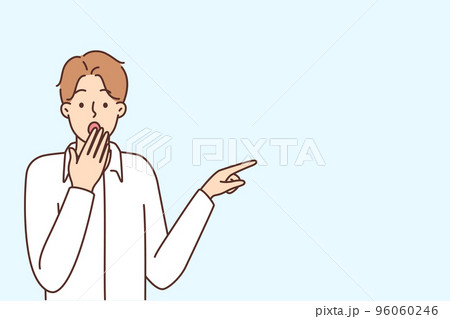 Stunned man point at blank copy space Stunned man point at blank copy space 96060246