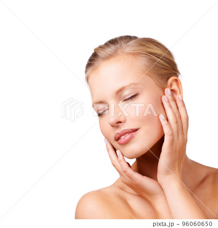 Captivated by her silky smooth skin. Studio shot of a gorgeous young blond woman. 96060650