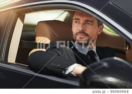 Success in motion. Cropped shot of a businessman on his morning commute to work. 96060668