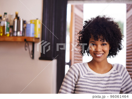 My home, my sanctuary. Portrait of a beautiful young woman at home. My home, my sanctuary. Portrait of a beautiful young woman at home. 96061464