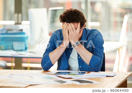 One of those days. Shot a frustrated designer sitting at his desk. One of those days. Shot a frustrated designer sitting at his desk. 96064490