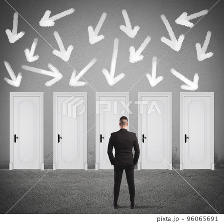 Concept of businessman choosing the right door 96065691