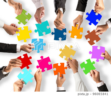 Teamwork and integration concept with puzzle pieces 96065841