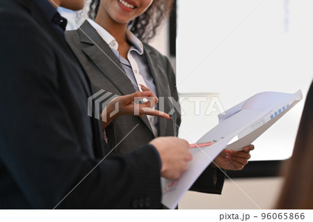 Cropped shot of executive manager discussing business plan with her coworker at board room meeting 96065866