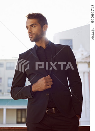 Stylishly confident. Cropped shot of a handsome and confident young man. Stylishly confident. Cropped shot of a handsome and confident young man. 96066718