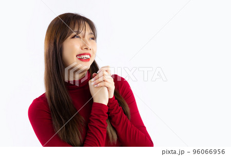 Beautiful asian woman long hair style in red long sleeve t-shirt looking away white background. Beautiful asian woman long hair style in red long sleeve t-shirt looking away white background. 96066956