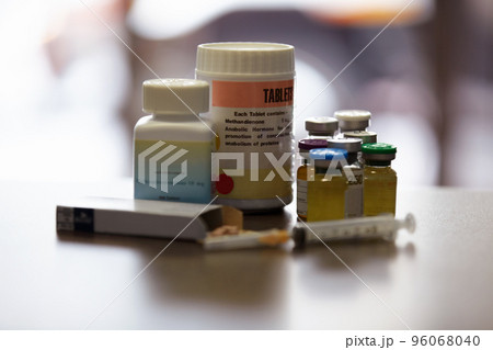 Closeup of an assortment of bodybuilding supplementssteroids. Closeup of an assortment of bodybuilding supplementssteroids. 96068040