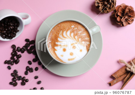 hot cappuccino with latte art isolated in pink background 96076787