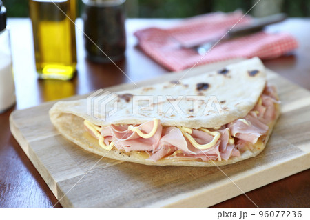 Italian cuisine , Piadina with Italian ham and cheese 96077236