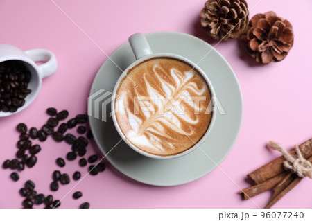 hot cappuccino with latte art isolated in pink background 96077240