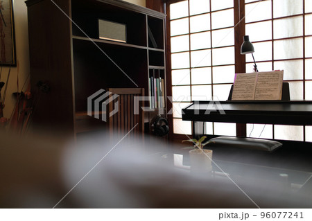 Living room with Piano in home 96077241