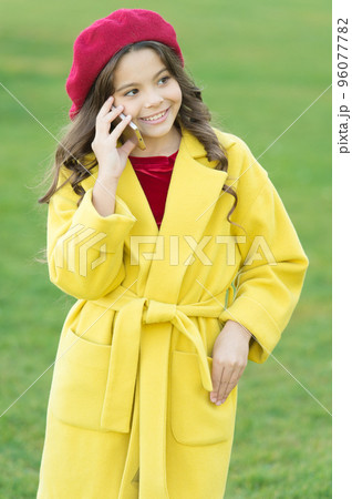 communication concept. parisian girl kid in french beret speak on phone. autumn fashion. fall season. happy childhood. small child with phone. beauty in autumn coat. cheerful little girl in coat communication concept. parisian girl kid in french beret speak on phone. autumn fashion. fall season. happy childhood. small child with phone. beauty in autumn coat. cheerful little girl in coat 96077782