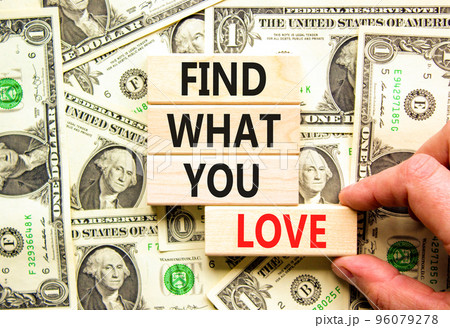 Find what you love symbol. Concept words Find what you love on wooden blocks. Beautiful background from dollar bills. Businessman hand. Business, psychological find what you love concept. Copy space. Find what you love symbol. Concept words Find what you love on wooden blocks. Beautiful background from dollar bills. Businessman hand. Business, psychological find what you love concept. Copy space. 96079278