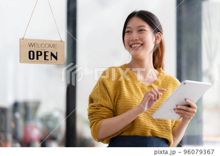 Portrait of Startup successful small business owner in coffee shop. SME entrepreneur seller business concept Portrait of Startup successful small business owner in coffee shop. SME entrepreneur seller business concept 96079367