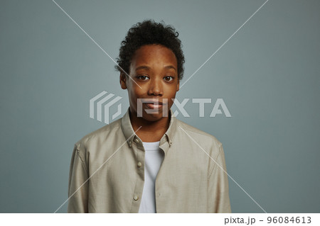Waist portrait of cute pre-teen schoolboy in casualwear 96084613