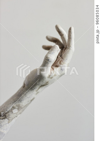 Hand covered in white paint, Hand covered in white paint, 96085034