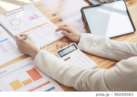 Successful female entrepreneurs are analyzing market data, budgets, taxes, investments, risk management in the workplace. Successful female entrepreneurs are analyzing market data, budgets, taxes, investments, risk management in the workplace. 96090065