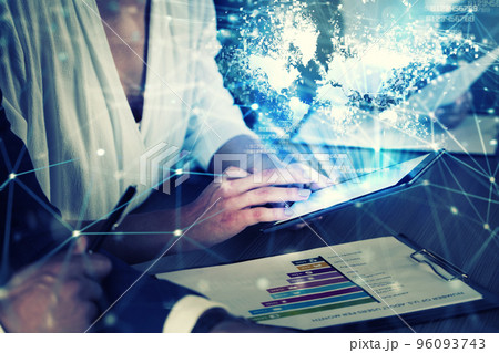 Businessperson in office connected on internet network with tablet. concept of partnership and teamwork 96093743