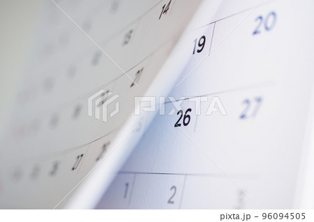 calendar page flipping sheet close up background 96094505