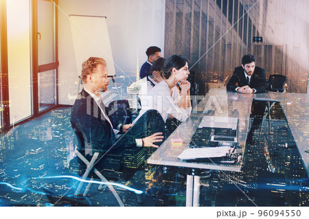 Businessperson in office with network effect. concept of partnership and teamwork Businessperson in office with network effect. concept of partnership and teamwork 96094550