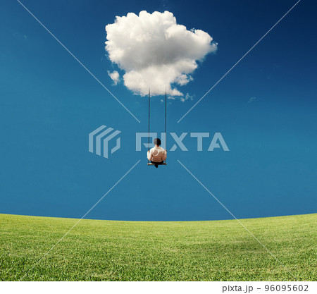 Businesswoman on a swing 96095602