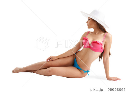 Girl in bikini sunbathing on beach. Isolated on white background 96098063