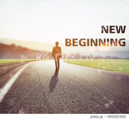 Man walks on an unknown road for a new adventure 96098360