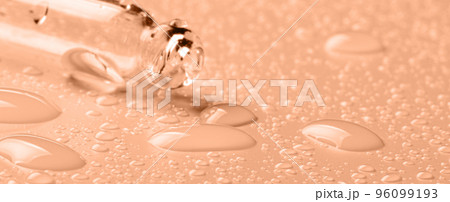Pipette and drops of cosmetics for moisturizing or removing makeup. Micellar water. Macrophotography. 96099193